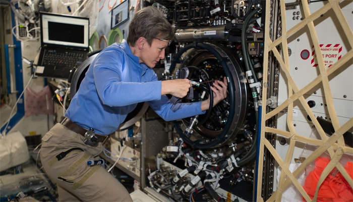 Expedition 51 Commander Peggy Whitson of NASA performs investigative troubleshooting in December 2016