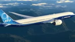 Boeing 777-9-r7bdyp_exp_777-9_side_above_clouds_02b